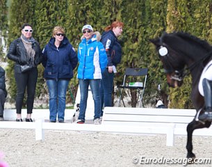 Aslanova's team watching Maria ride