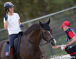 Groom Alan Davies gives Valegro a lump of sugar