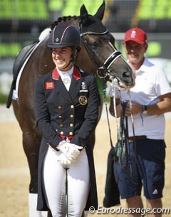 Golden girl Charlotte Dujardin, groom Alan Davies holding Valegro