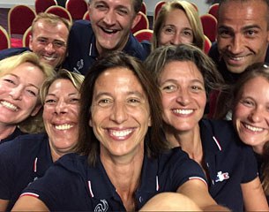 The French team and its officials take a selfie