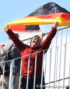 Barbara Schnell waving the German flag