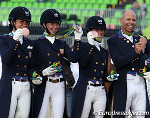 The American team (Allison Brock, Laura Graves, Kasey Perry, Steffen Peters) shows proudly their bronze medal