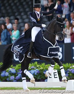 Dorothee Schneider and Sezuan win the 7-year old division at the 2016 World Young Horse Championships :: Photo © Astrid Appels