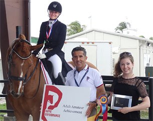 Signe Kirk Kristiansen was honored with the Piaffe Performance Adult Amateur Achievement Award presented by Dr. Cesar Parra (middle) at the Adequan Global Dressage Festival 