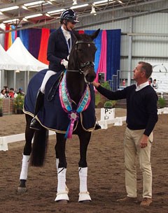 Maree Tomkinson on Donna Elena getting congratulated by sponsor Dr. Ulf Möller representing PSI/Hof Kasselmann at 2016 CDI-W Werribee