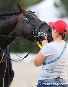 Groom kisses Damsey