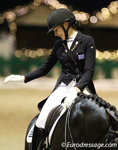 Livanos pats her horse
