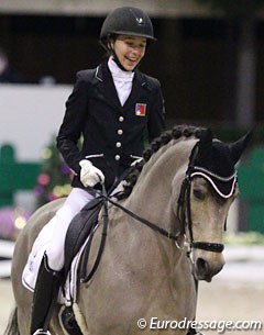 Katarina Scheufele has a big smile at the end of her ride on Now and Forever Feivel