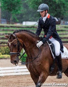 Michael Bugan pats For President at the end of his ride at the 2017 CDI-W Brno :: Photo © Lukasz Kowalski