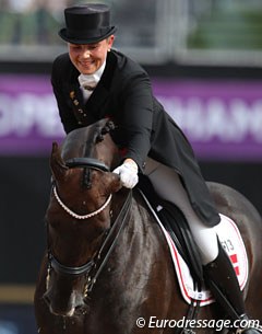 Anna Kasprzak pulls Donnperignon's ear at the end of their freestyle, which ranked them seventh
