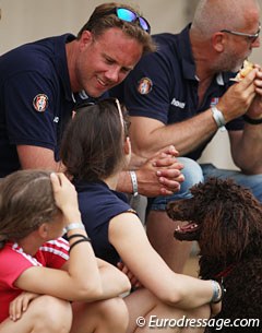 Norwegian pony team members sitting ringside to watch the CDI-tour