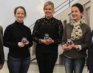 Judy Reynolds, Heike Holstein, Anna Merveldt, receiving their FEI Badges of Honour at the 2017 CDI-W London