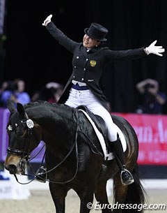Russian Inessa Merkulova celebrates her fourth World Cup Finals' ride on Mister X