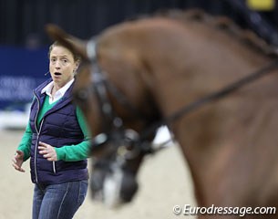 Isabell Werth working with Totem