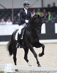 Charlotte Fry and Don Joe (by Diego x Lord Leatherdale) braving the first bit of rain of the day