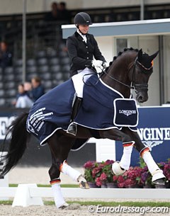 Ann-Christin Wienkamp and Don Martillo win the 5-year old preliminary test at the 2017 World Young Horse Championships :: Photo © Astrid Appels