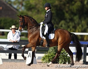 Owner Betsy Juliano watching Adrienne Lyle competing her 2011 PSI Auction horse Riccidoff (by Riccione x Don Davidoff)