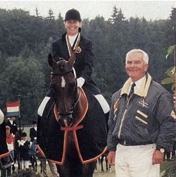 Veronique Wuydts on Emmaly with Belgian chef d'equipe Jan Meersmans on her side at the 1995 European Pony Championships in Achselschwang, Germany