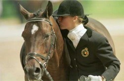 A big kiss for her gold medal winning pony