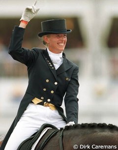 Anky van Grunsven raises her arm in victory