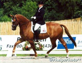 Birgitt van der Eijken and Roval Investment Take an Early Lead in the 1999 World Young Horse Championships :: Photo © Mary Phelps