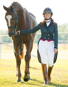 Angelea Walkup and her 11-year old Sir Donnerhall offspring in hand :: Photo © Michael Tacket