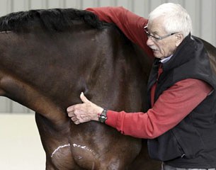 Dr Ridgway assessing shoulder muscles