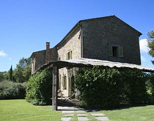 Side view with pergola which offers ample shade for relaxing and room for outdoor dining