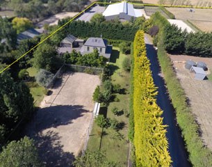 The residence and tennis court