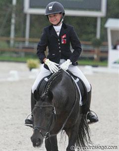 Swiss rider Estelle Wettstein on Rhythm n Blues. This is how we like to see riders leave the arena: with a big smile on their face