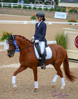 Miki Yang and Garden's Sam kick off the children's division with a win in the first round at the 2018 U.S. Dressage Championships :: Photo © Sue Stickle