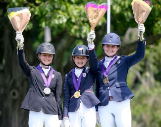 Dennesy Rogers, Annelise Klepper and Isabelle Braden win the individual test medals at the 2019 North American Junior Riders Championships :: Photo © Meg McGuire