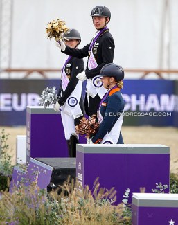 Semmieke Rothenberger, Raphael Netz and Jessica Poelman on the podium for the short grand prix medals at the 2021 European U25 Championships :: Photo © Astrid Appels