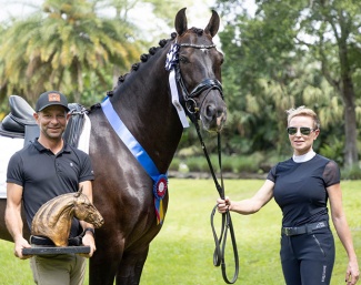 David Marcus with the USPRE High Point award, which he won aboard Silver Drache Farm's Urbano FSR II who is held by owner Andrea Eppley :: Photo © Lily Forado