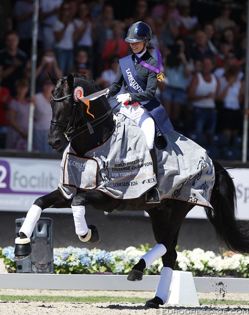 Charlotte Fry and Glamourdale win the 7-year old Finals at the 2018 World Young Horse Championships :: Photo © Astrid Appels