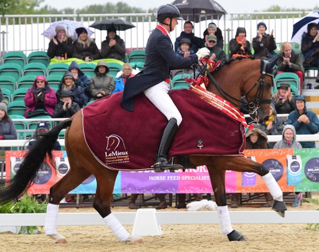 Gareth Hughes and Briolinca win the Grand Prix at the 2018 British Dressage Championships :: Photo © Kevin Sparrow