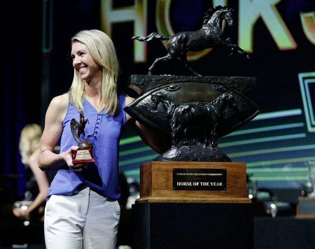 Laura Graves receives the trophy for Verdades' title as 2018 USEF International Horse of the Year at the Pegasus Awards Dinner