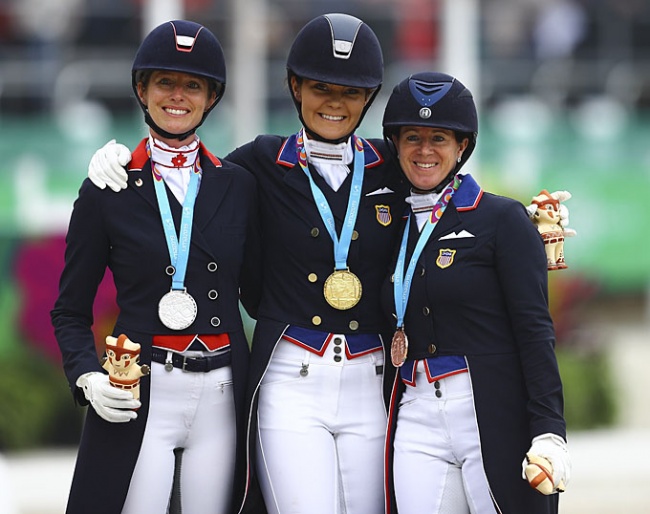 On the Individual Dressage podium at the Pan American Games 2019 are silver medallist Tina Irwin (CAN), gold medallist Sarah Lockman (USA) and bronze medallist Jennifer Baumert (USA) :: Photo © Daniel Apuy