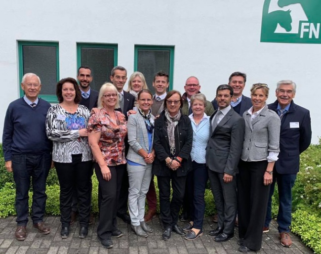 Thirteen judges pass the CDI-YH judging exam in Warendorf, led by Dieter Schüle (far left) and Ghislain Fouarge (far right)