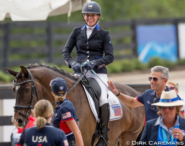 U.S. Para team trainer Michel Assouline patting Rebecca Hart on the leg after winning bronze at the 2018 World Equestrian Games in Tryon :: Photo © Sharon Vandeput