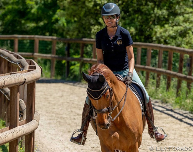 Beatriz Ferrer-Salat back in the saddle and here on the canter track with Rosini at her Villa Equus in Barcelona :: Photo © Lily Forado
