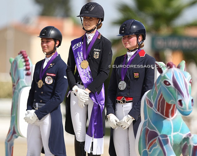 Paul Jöbstl, Lucie-Anouk Baumgurtel and Annabella Pidgley on the Kur podium at the 2021 European Junior Riders Championships :: Photo © Astrid Appels