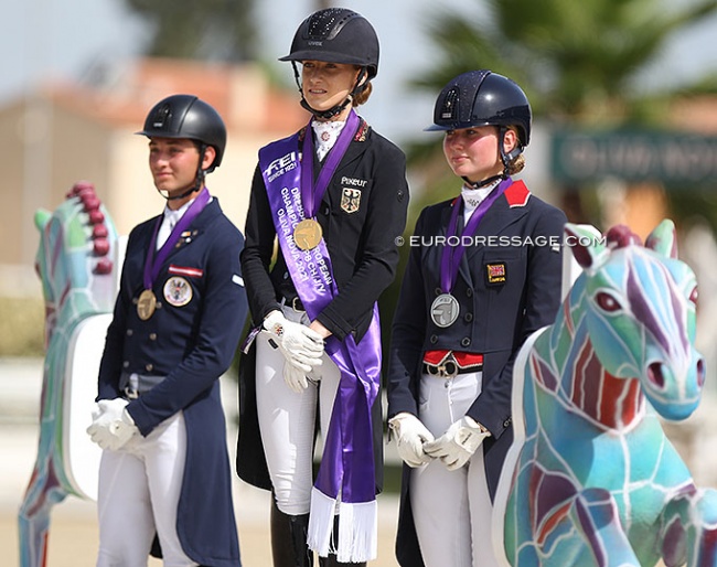 Paul Jöbstl, Lucie-Anouk Baumgurtel and Annabella Pidgley on the Kur podium at the 2021 European Junior Riders Championships :: Photo © Astrid Appels