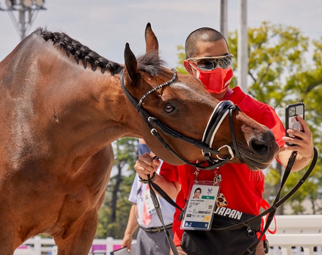 Japan's Grade IV athlete Katsuji Takashima and his horse Huzette pose for a selfie after the Para Dressage horse inspection at the Tokyo 2020 Paralympic Games (FEI/Liz Gregg)