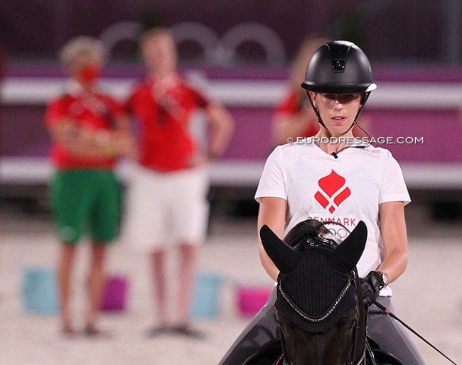 Carina Cassoe Kruth at the 2021 Olympics. She brought her own trainer Andreas Helgstrand to Tokyo. On this photo Kyra Kyrklynd and Danish team trainer Nathalie zu Sayn-Wittgenstein are watching her schooling session :: Photo © Astrid Appels