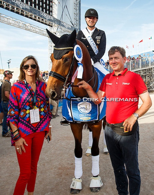 Gonnelien and Sven Rothenberger with their son Sönke on Cosmo at the 2018 World Equestrian Games :: Photo © Dirk Caremans