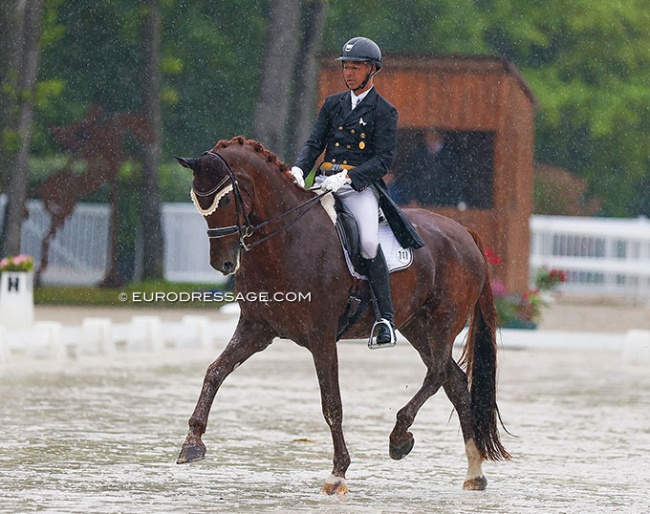 Gilles Ngovan competing Zig Zag in the rain at the 2022 CDIO Compiegne :: Photo © Astrid Appels