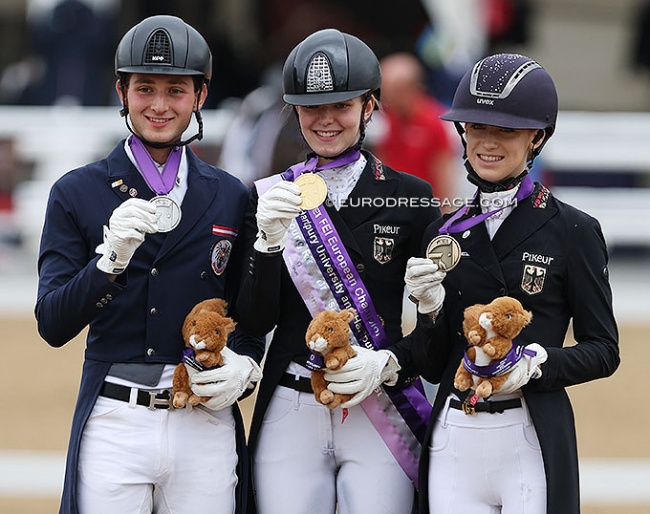 Paul Jöbstl, Helena Schmitz-Morkramer, and Lucie-Anouk Baumgurtel on the kur podium at the 2022 European Young Riders Championships :: Photo © Astrid Appels