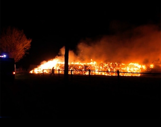 Hay bales on fire at Gestut Lewitz