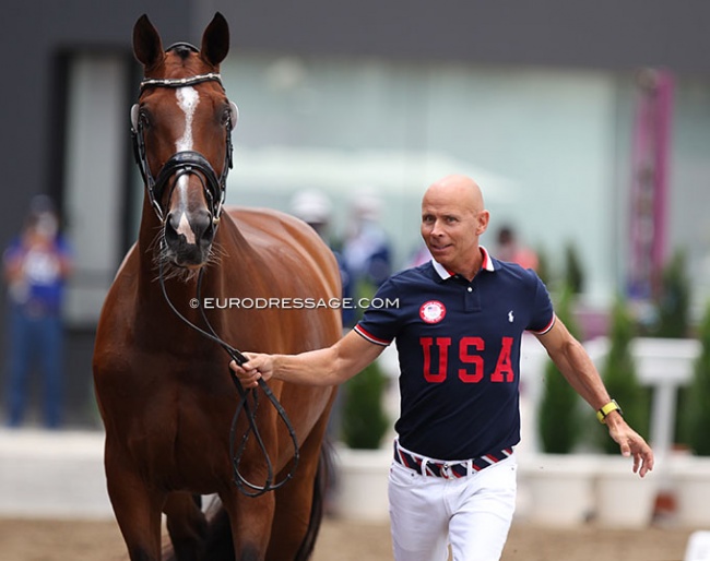 Steffen Peters trotting up Suppenkasper at the 2021 Tokyo Olympics. The only U.S. pair seemingly left in the running for the 2024 Olympics :: Photo © Astrid Appels